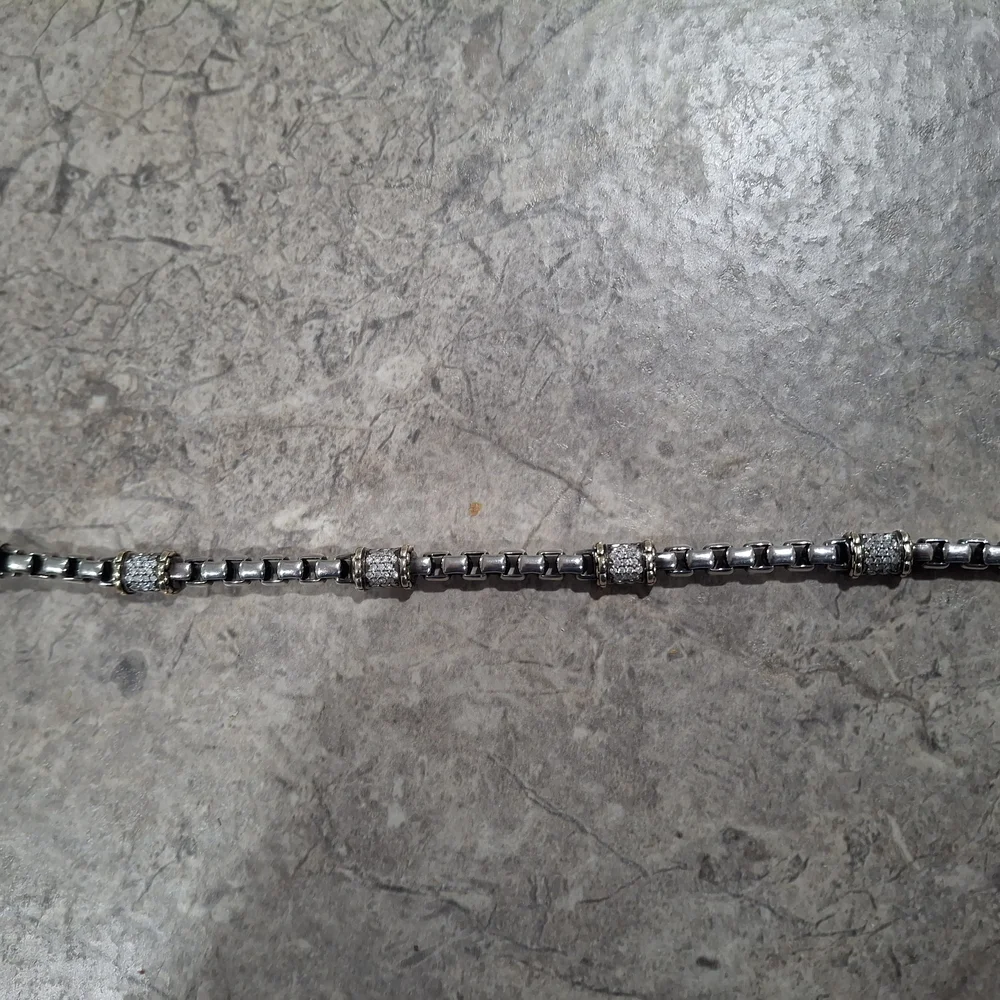 Silver and Gold Bracelet with Elegant Design - Picture 1 of 4